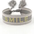 Grijs en beige geweven polsbandje met SMILE-gouden studs en kwastjes-accenten - Grijs Wit Goud SMILE (T009)