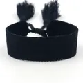 Ethnic style black woven wristband with adjustable tassel ties in minimalist design - Black (B017)