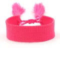 Fuchsia ethnic woven bracelet with adjustable tassels and a wide plain weave pattern - Fuchsia (B042)