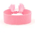 Pink woven wristband bracelet with fringe tassels and adjustable knot closure - Pink (B043)