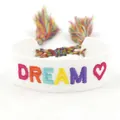 White canvas friendship bracelet with rainbow DREAM embroidery and tassel ties - Rainbow DREAM