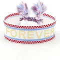 White woven friendship bracelet with blue and red stripes featuring Forever lettering - Gold FOREVER Style
