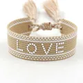 Bohemian khaki woven bracelet with white LOVE lettering and matching tassel details - Silver LOVE Style 2