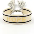 Bohemian woven friendship bracelet in beige and black with HOPE gold metal lettering - Gold HOPE Style 2