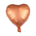 Detail of 18 inch rose gold heart foil balloon with a matte metallic finish texture - Orange