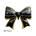 Large black and gold bow-shaped foil balloon with star patterns for party decor, 98x75cm - Black with Gold Edge and Stars