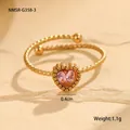 Detalle de anillo de corazón dorado con piedra rosa, muestra 0,4 cm de ancho y 1,1 g peso - Talla única / Anillo Abierto de Corazón Rosa con Textura de Torsión (NMSR-G358-3)