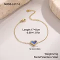 Macro de bracelet coeur en acier doré 17+5cm avec pendentif en perle bleue et zircon - Bleu Foncé (NMSB-L617-5)