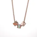Detailed macro view of rose gold dice pendant with number one and colorful dots - Rose Gold Style 1 (Rose Gold Dice Necklace)