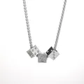 Macro detail of silver titanium steel necklace featuring three engraved dice cube pendants - Silver Classic Dice (Style 4)
