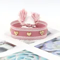 Handmade woven pink friendship bracelet with golden heart rivets and tassel drawstring - Gold Heart Rivets / Rose Pink (H-G-022)