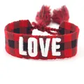 Close-up of red and black buffalo plaid braided bracelet with white LOVE embroidery - Size 7