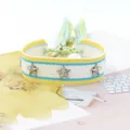 Pulsera boho tejida con remaches de estrellas plateadas y borlas de flecos azul-amarillo - Azul y Amarillo (19#)