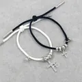Magnetic couples bracelets with rhinestone crosses and vintage silver beads on braided rope - Black and White Rope Cross