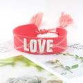 Pink woven wristband featuring 3D LOVE embroidery and matching tassels for women - 24#