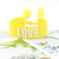 Adjustable yellow woven friendship bracelet with white embroidered LOVE text and tassels - 29#
