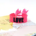 Pink woven friendship bracelet with black embroidered LOVE letters and adjustable tassels - Style 37 White Floral