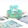 Handwoven mint green bracelet with golden heart rivets and adjustable tassel string - Gold Heart Rivets / Mint Green (H-G-014)