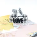 Gray and white plaid woven friendship bracelet with LOVE 3D embroidery and tassels - Style 48 White Strawberry