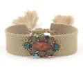Etnische geweven armband met grote centrale edelsteen en kleurrijke kwastjes dames - Khaki