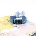 Blue woven friendship bracelet with LOVE embroidery and white diamond patterns and tassels - Style 55 Navy Orange Floral