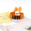 Adjustable orange woven LOVE letter friendship bracelet with embroidered diamond pattern - Style 57 Navy Leaf/Orange Flower
