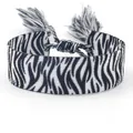 Adjustable zebra print woven friendship bracelet with decorative black and white tassels - Zebra Pattern B158