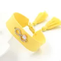 Infinity symbol braided ribbon bracelet with rhinestones and yellow tassels - Yellow