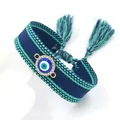 Braided Evil Eye bracelet with blue woven strap, crystal inlay, and tassel accents - Deep Blue Green Edge (10#A)