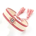 Fashionable evil eye woven bracelet with rhinestones and red tassel on white background - Beige Red Edge (09#A)