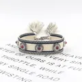 Bohemian braided cream bracelet with metal studs, red beads, and fringe tassels - 16# (Cream and Black)