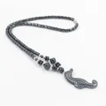 Donkergrijze hematiet kralenketting met gedetailleerde zeepaardje hanger unisex - Zeepaardje Stijl