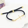 Bracciale intrecciato nero regolabile con ciondolo a croce in acciaio inox dorato lucido - Stile Croce Oro