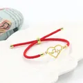 Bracciale intrecciato rosso regolabile con ciondolo a cuore d'oro e motivo battito - Stile ECG Cuore Oro