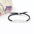 Verstelbare bruine gevlochten armband met zilveren STAR-bedel en metalen uiteinden - Staal Kleur + Bruin