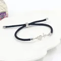 Minimalistische zwarte touwarmband met zilveren hart en EKG-bedeltje voor vriendschap - Hartslag ECG Stijl / Staal + Zwart