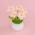Handmade crocheted pink Forget-me-not flowers in a white pot - Nude