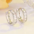 Polished S925 silver hoop earrings with cubic zirconia stones in elegant lighting - Platinum White Zirconia
