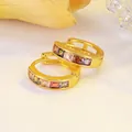 Macro detail of gold plated hoop earrings with multicolored square inlaid gemstones - Gold Multi Zirconia