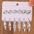 Detail of silver earring set with textured heart, square studs and hoop earrings - 6-Pair Silver Hammered Textured Earrings Set / Silver (10369)