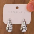 Silver teardrop C-shaped earrings with spiral texture on jewelry card display - Silver 3D Tower Shape Earrings / Silver (N-201)