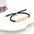 Bracciale regolabile in corda nera con ciondolo a lettera BABY dorata per uomo e donna - Stile Lettera Baby Oro