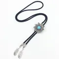 Vintage Bolo Tie with Turquoise Sunburst Pendant and Silver Feather Charms on Black Cord - Turquoise