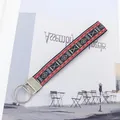 Cinturino da polso con motivo geometrico jacquard rosso e nero in stile etnico - Totem Etnico Geometrico Nero Rosso Bianco (10-05B)