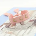 Pink woven fabric bracelet with golden embroidered moon and stylish tassel details - Moon Style / Pink