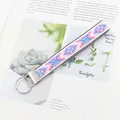 Cinturino etnico con motivi geometrici rosa, trama jacquard e chiusura in metallo argento - Motivo Ricamato Rombo Bianco Rosa Blu (09-10B)