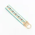 Portachiavi etnico in nastro jacquard 25mm con ricamo floreale arancione - Stile Personalizzato Fibbia Dorata (Nota)