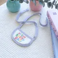 Detail of blue striped pet birthday bib with 'IT'S MY BIRTH DAY' colorful embroidery - S / Birthday Bib - Blue Border