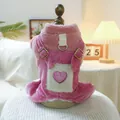 Macro detail of pink lamb wool pet vest with heart embroidery and metal D-ring attachment - Pink Heart Overalls