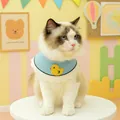 Light blue pet bandana with yellow duck embroidery and white lace on a Ragdoll cat - Blue Little Duck Bib